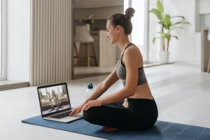 women working being a yoga teacher