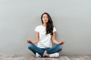 women who learned ​what is meditation practicing at home