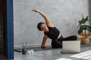 women practicing her yoga to help with anxiety