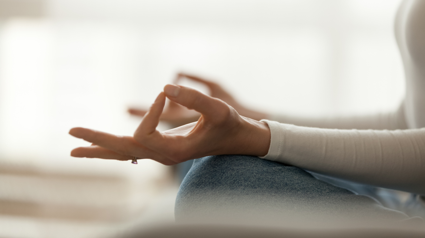 hands in meditative yoga pose