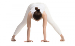 demonstration of women pose with hands flat on the ground