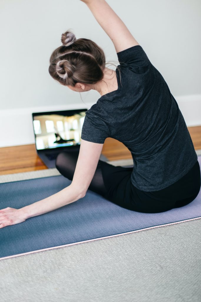 Girl doing yoga virtually Girl doing yoga virtually