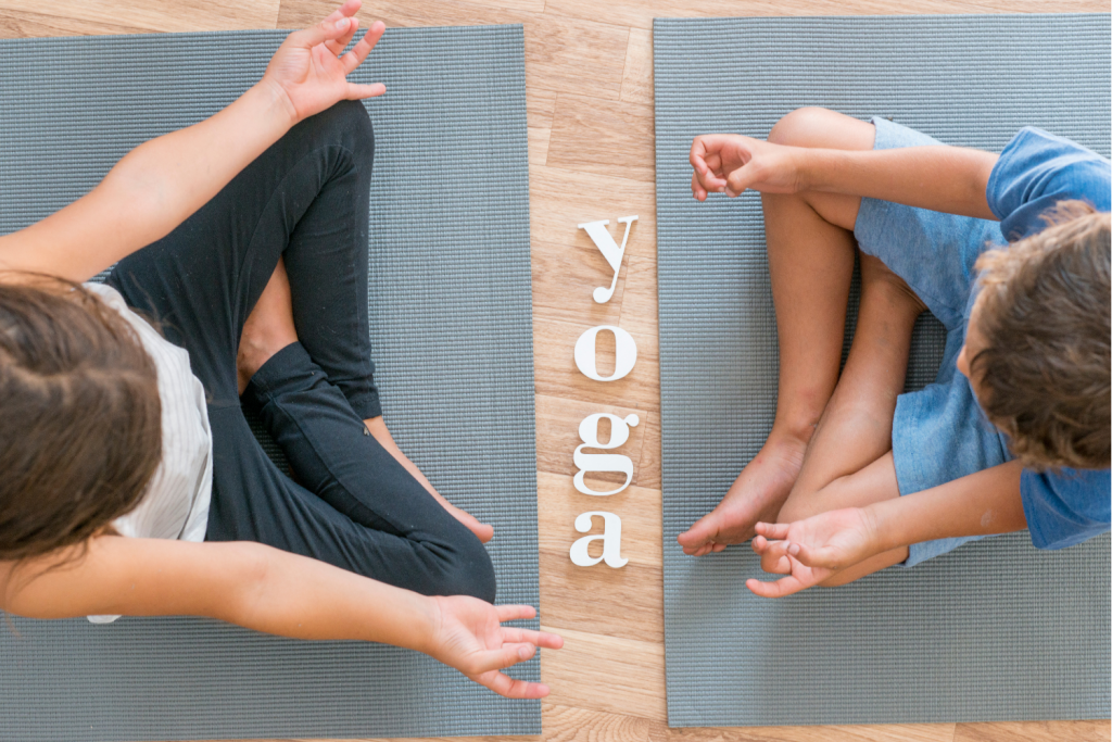 Kids on yoga mat