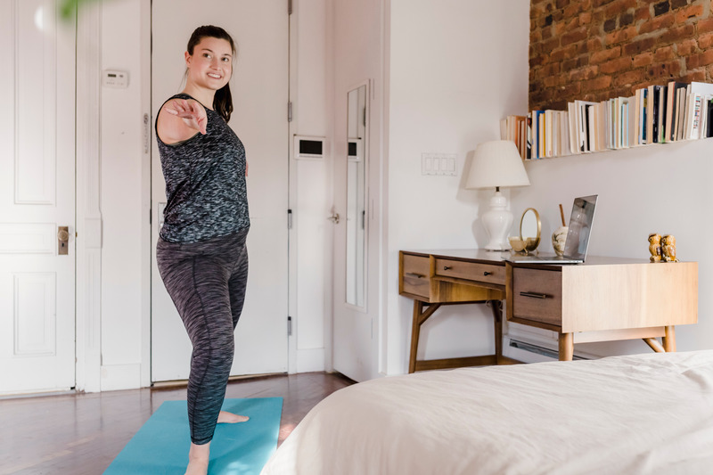 Girl in online yoga teacher training class