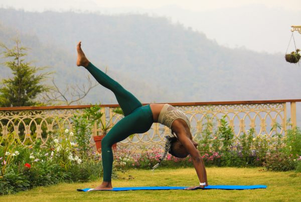 Yogi on mat outside in Rishikesh
