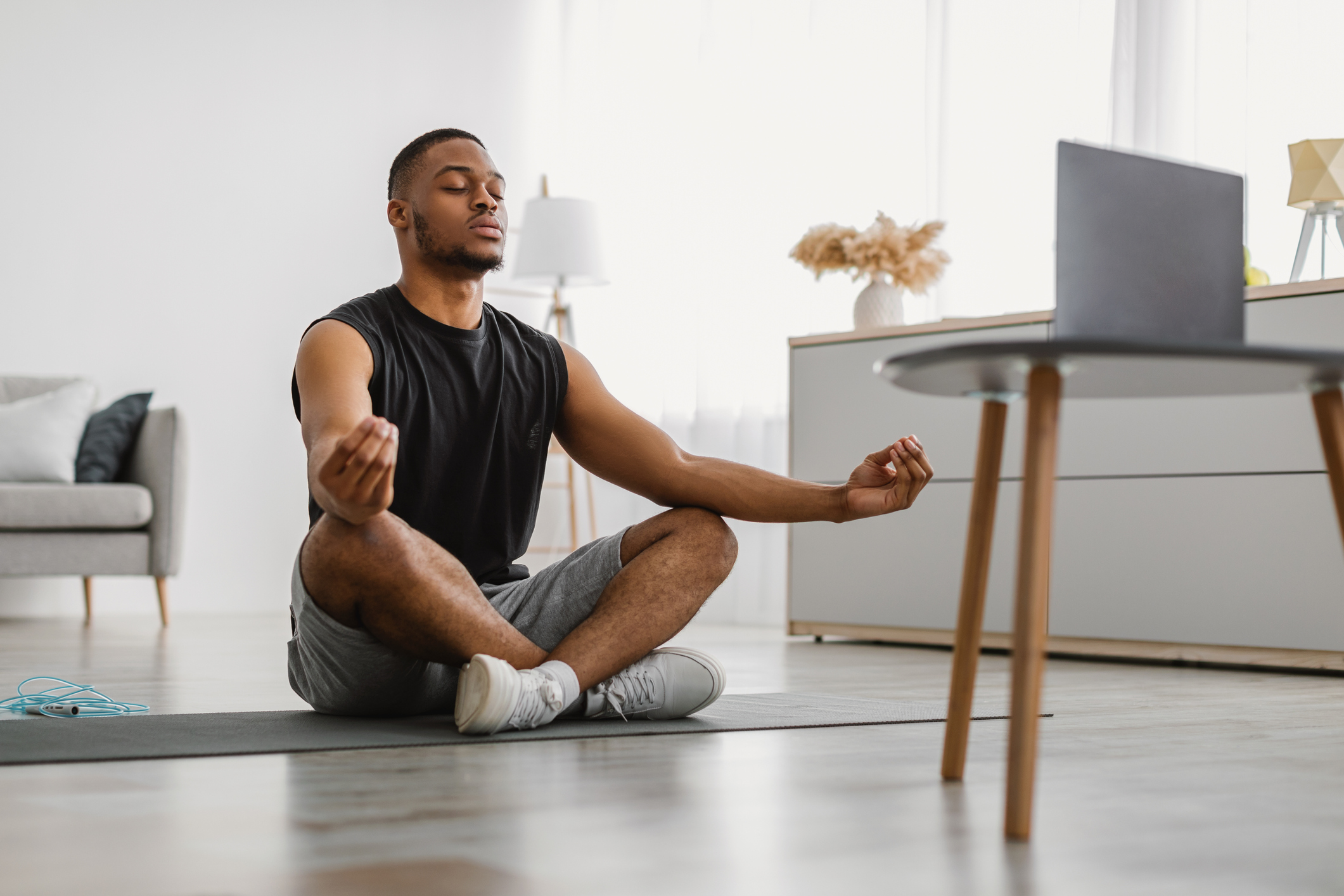 Athletic man in yoga pose