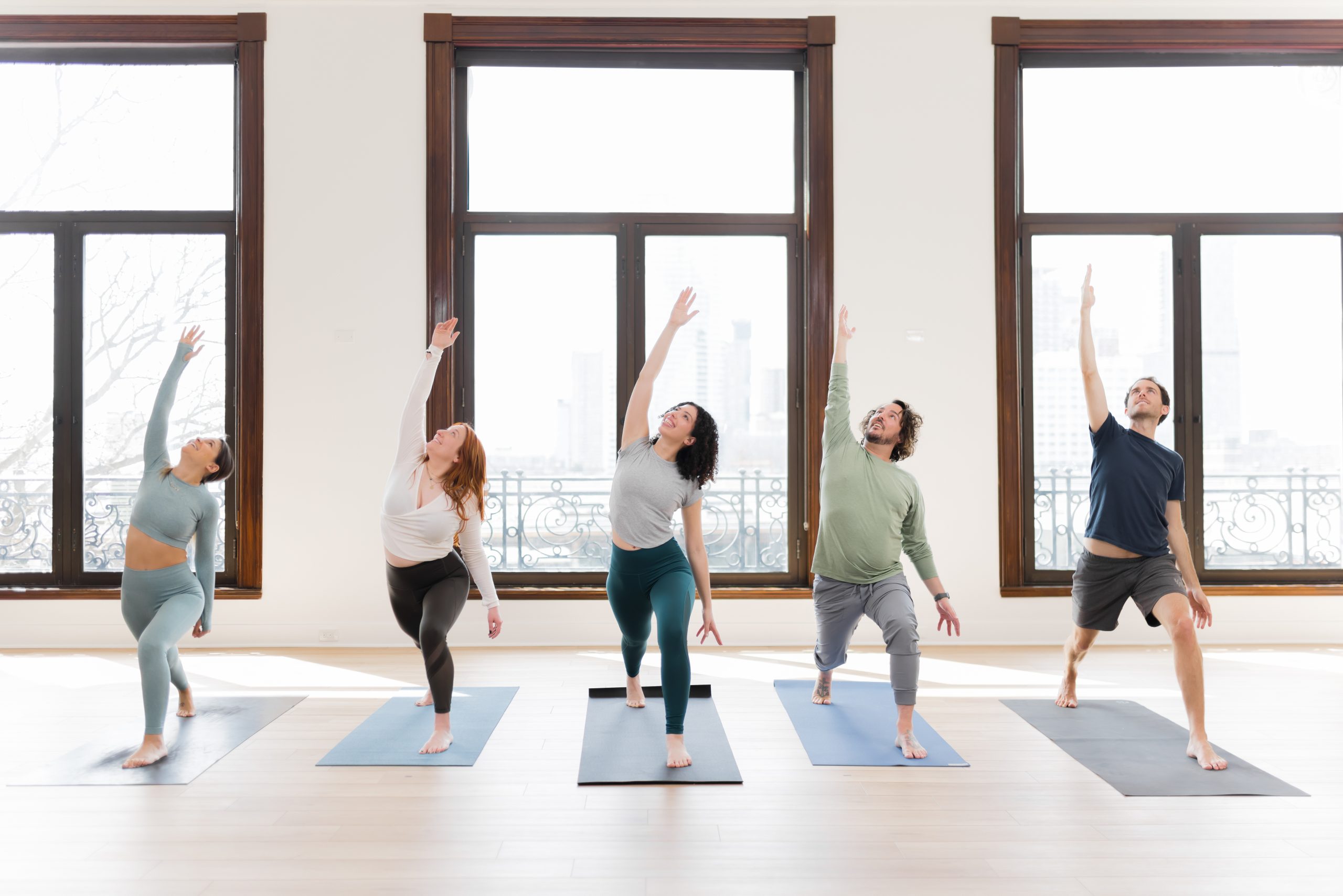 Yoga students taking a yoga class