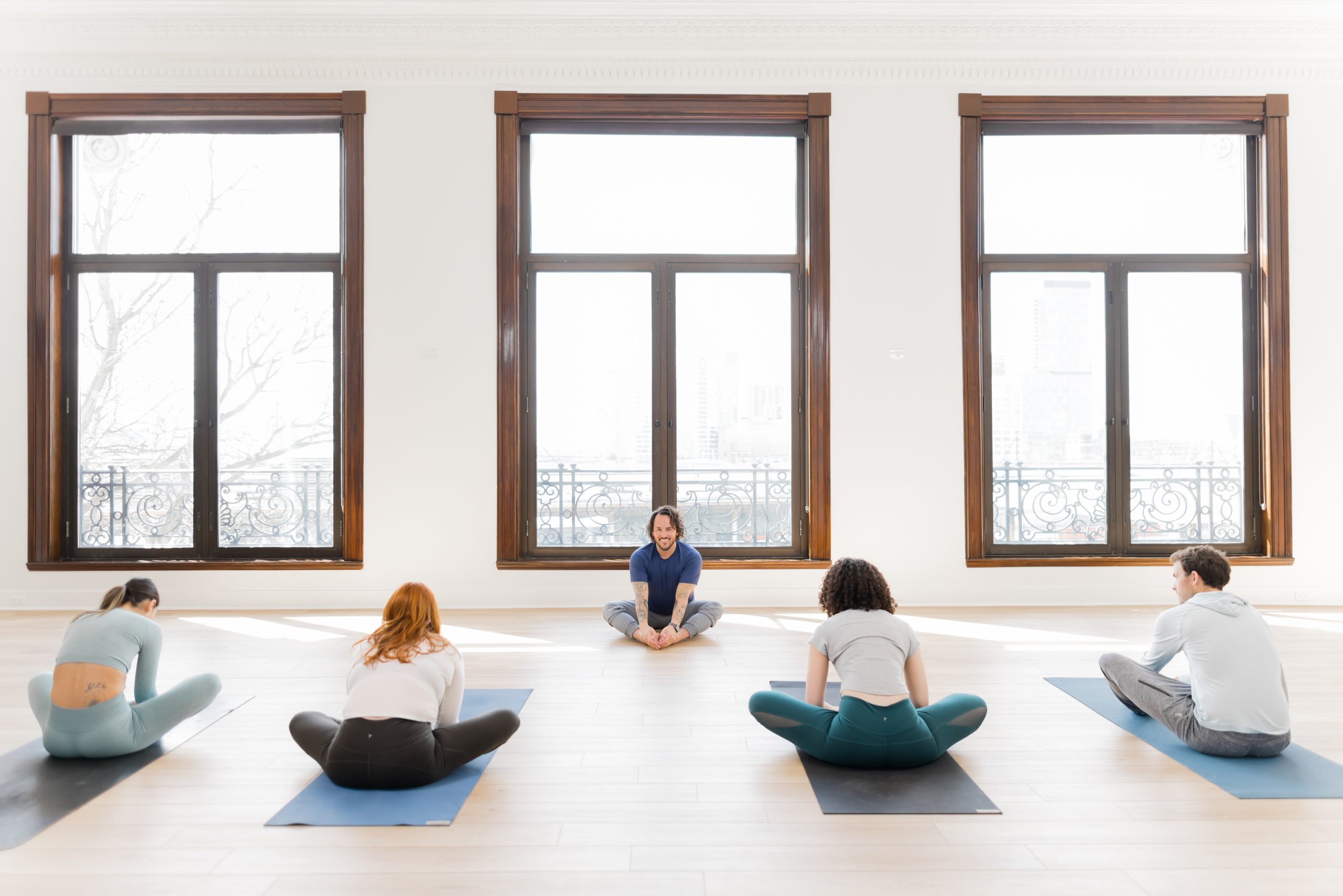 Patrick teaching a class full of yoga students