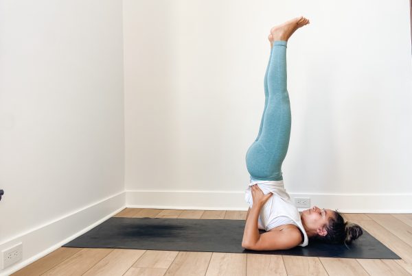Girl in shoulder stand