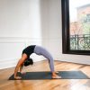 Girl in full wheel pose