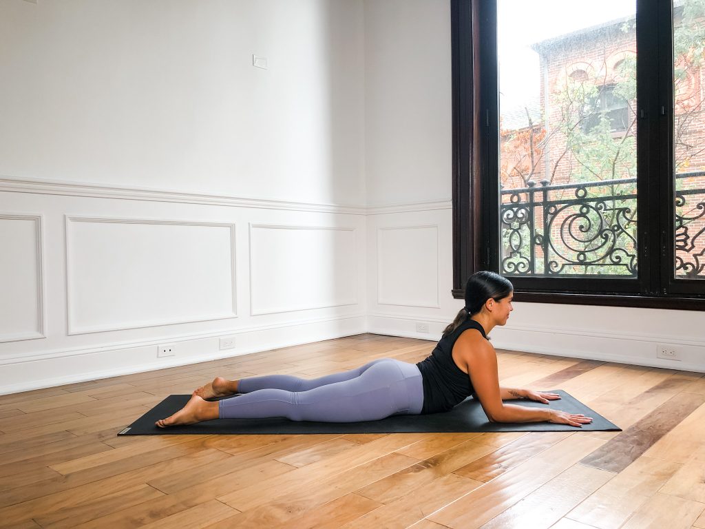 Girl in sphinx pose