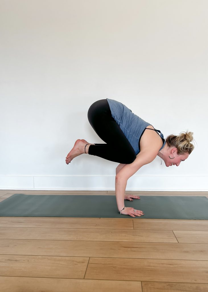 Yogi in crow pose