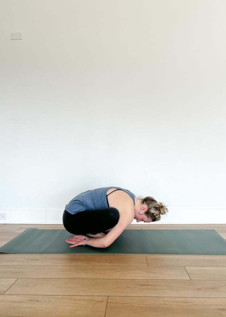 Garland pose (Malasana)