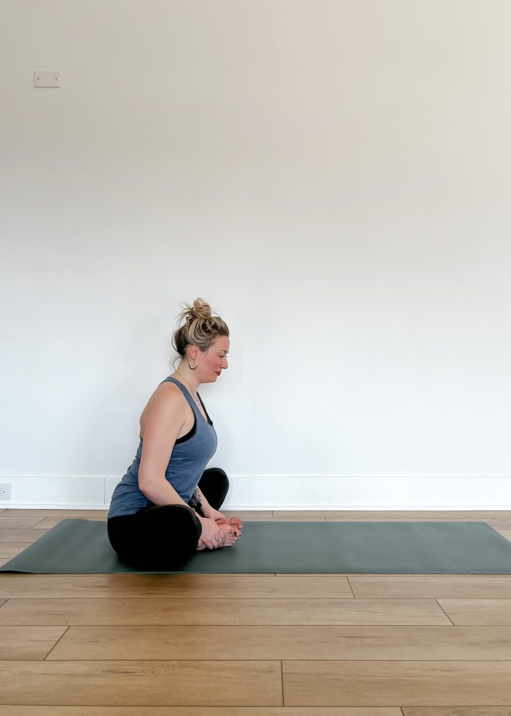 Woman in Baddha Konasana (Bound Angle Pose)