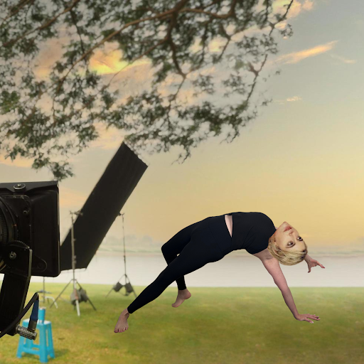 A photoshopped image of Greta Gerwig outside doing wild thing yoga pose in front of camera equipment