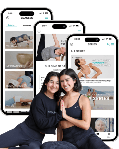 A screenshot of the YogaRenew online yoga app, featuring Alia & Isa Brand of YogaRenew holding prayer hands in the center of the image