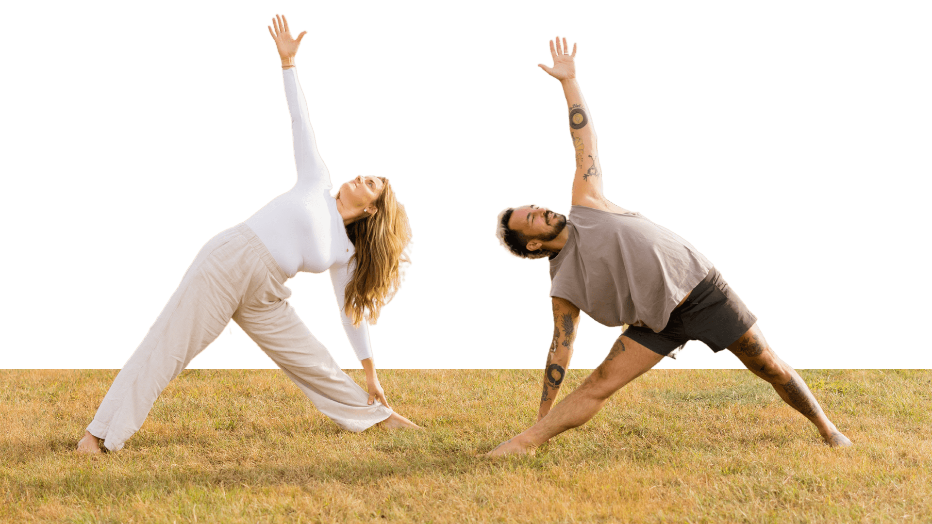 Kate and Patrick hero image of them both in triangle pose on the grass
