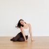 How Yoga Can Boost Your Mood photo of Isa Brand smiling at the camera