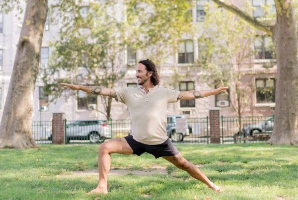 Patrick Franco in Warrior II to promote a 10 minute morning yoga flow