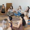 Yogis sitting meditating to quiet the Citta