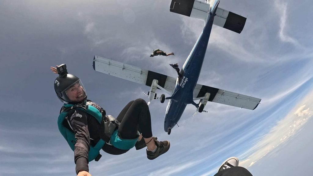 Lisa Bermudez jumping out of a plane, skydiving