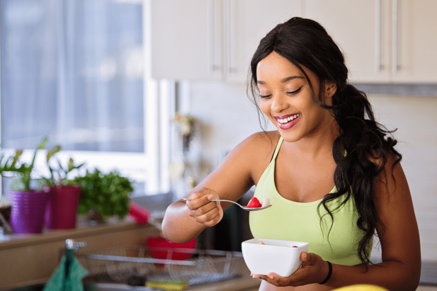 mindful eating blog hero image of a girl eating mindfully