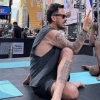 Patrick Franco teaches in Times Square for International Yoga Day