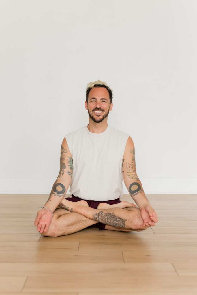 Patrick looking happy in lotus pose